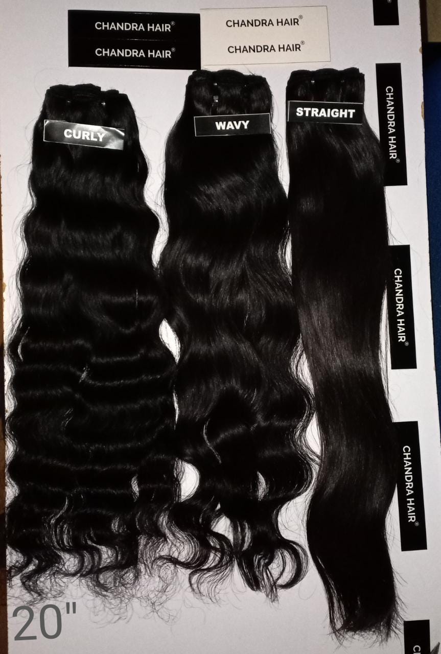 Raw South Indian natural wavy bundles labelled 20 inches, length chart photo