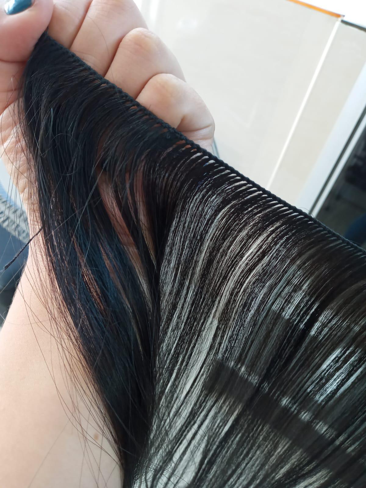 Raw South Indian natural wavy hand-tied wefts, sold by the bundle