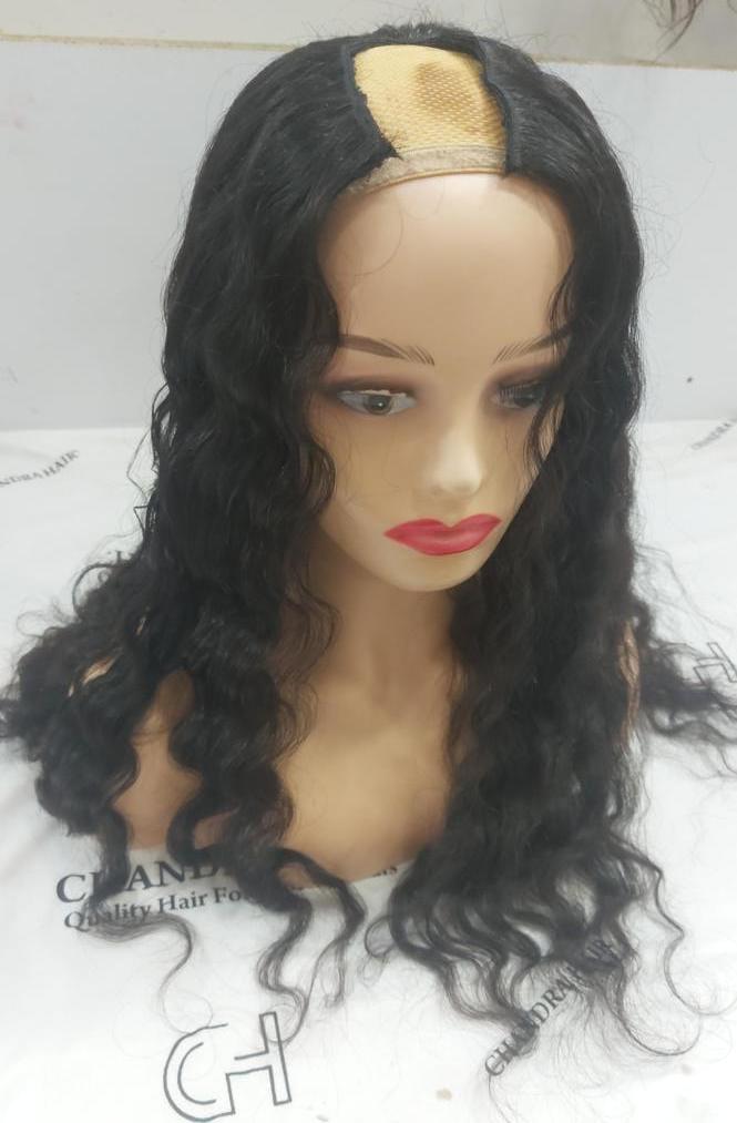 Custom U part wig on a mannequin, wavy hair left out at the part