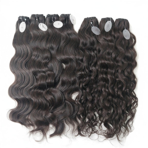South Indian raw natural wavy and natural curly hair bundles on a clean white background, Chandra Hair