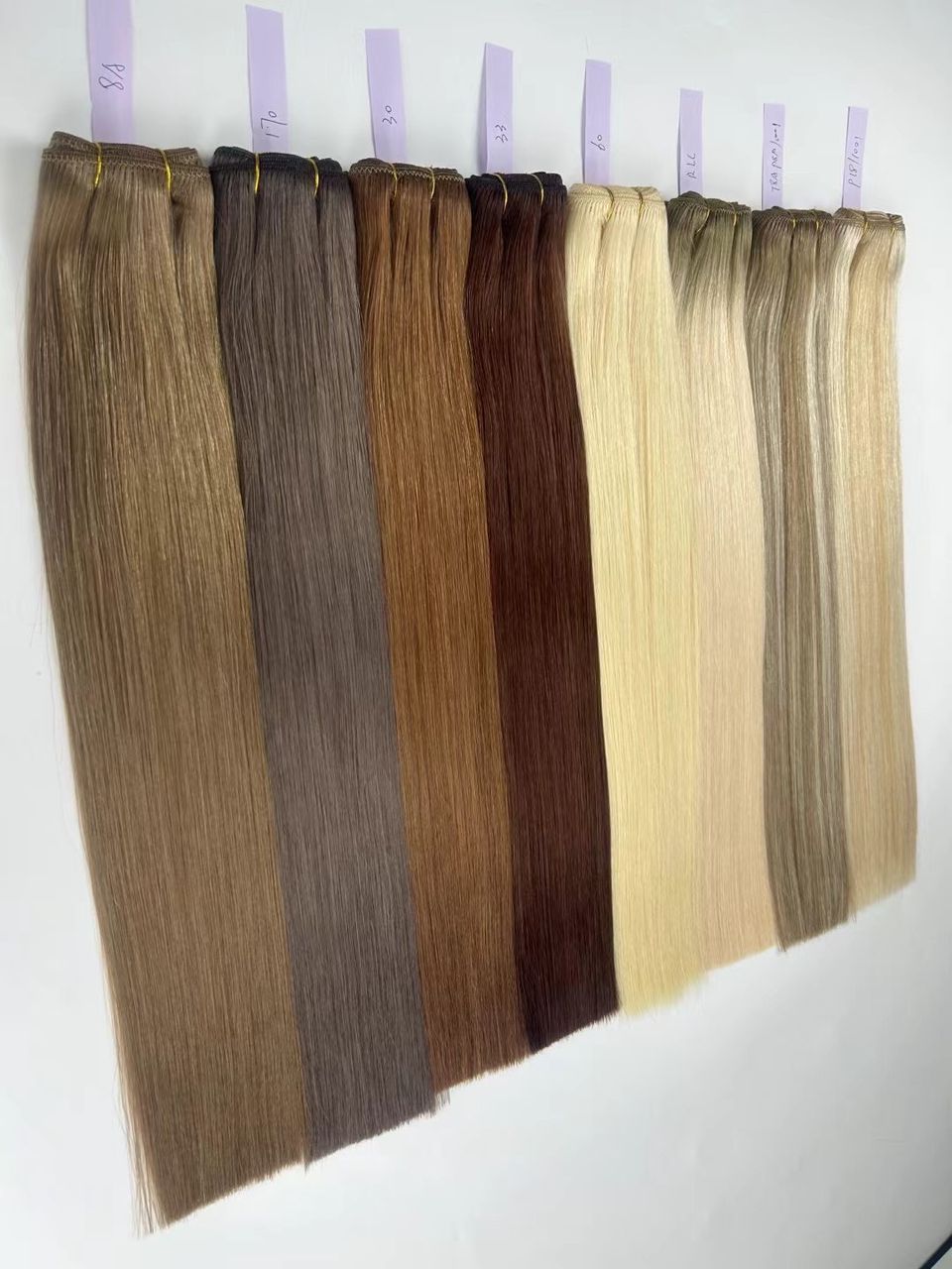 Double drawn straight colored genius wefts in 10A virgin hair, sold by the bundle