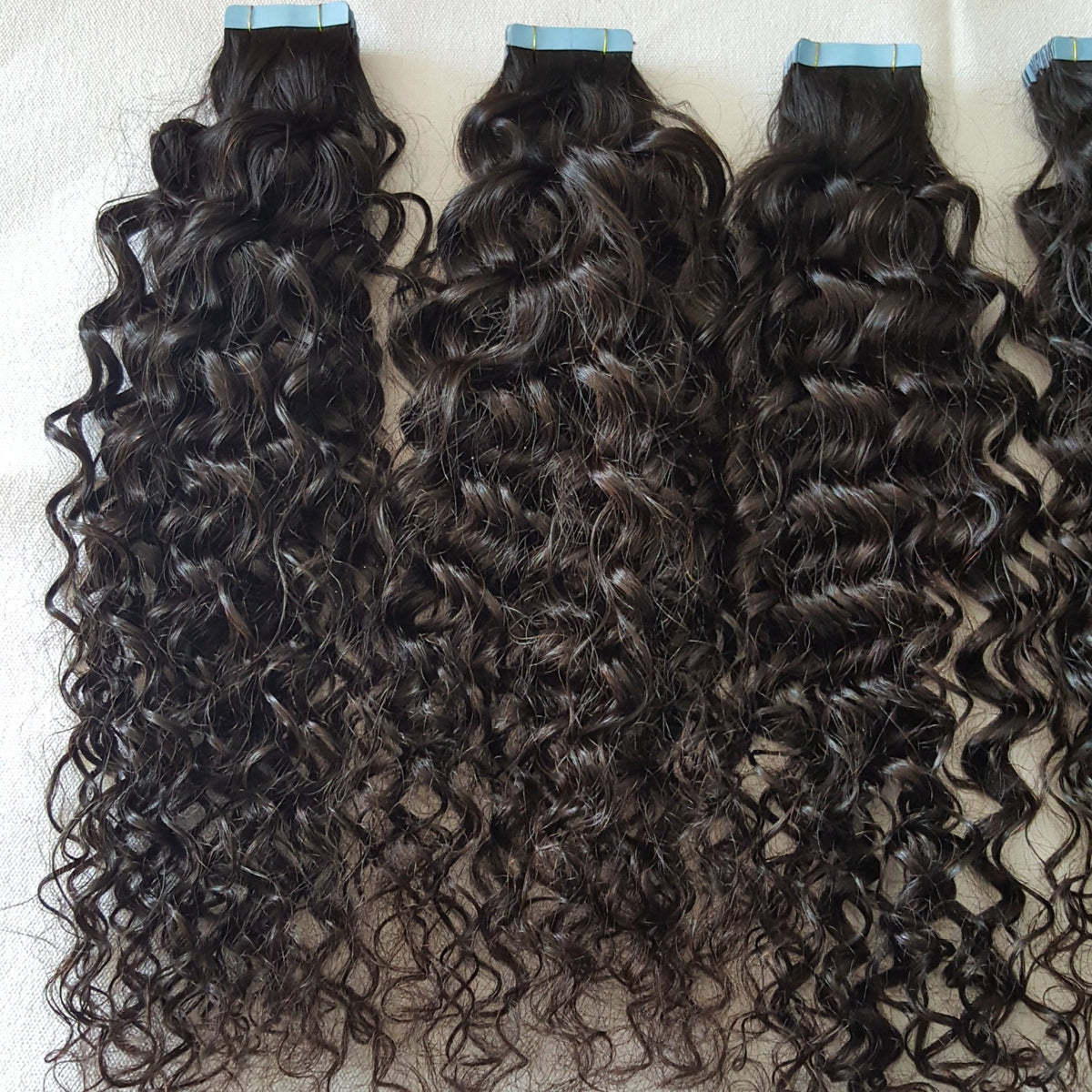 Curly 9A virgin hair tape-ins, another angle