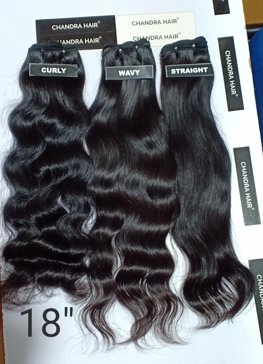 Raw South Indian natural wavy bundles labelled 18 inches, length chart photo
