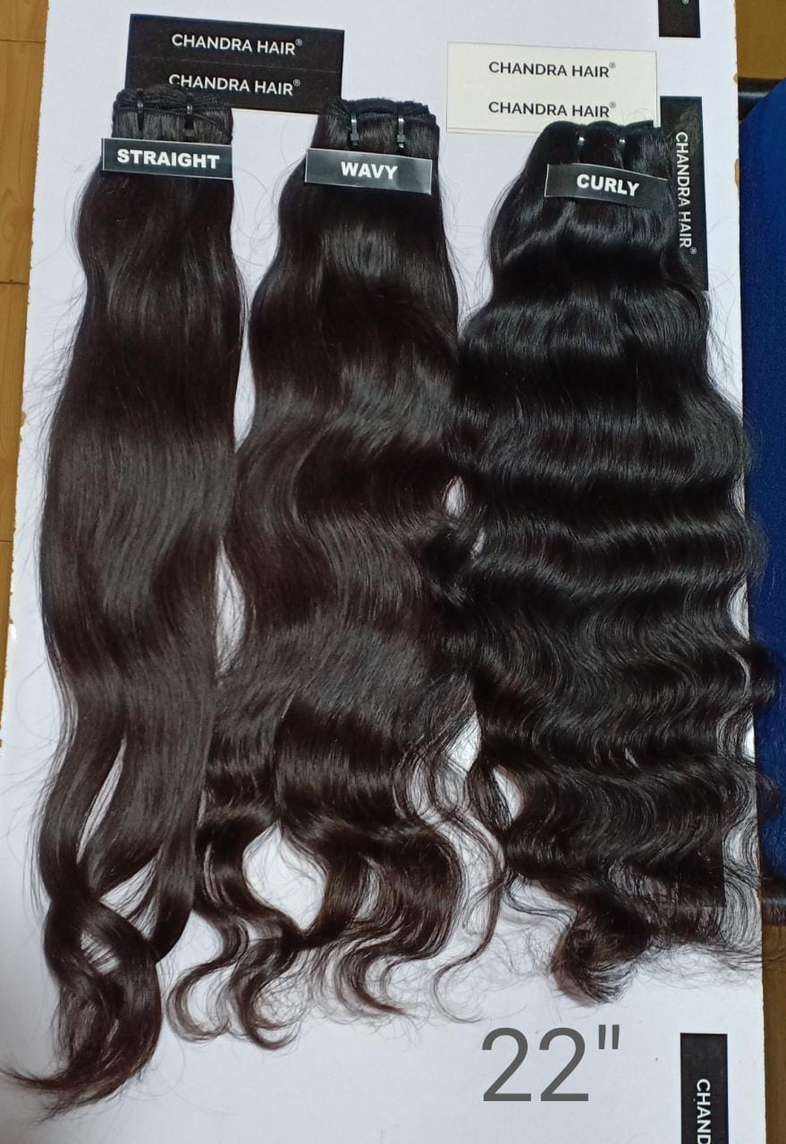 Raw South Indian hair bundles labelled 22 inches, length chart photo