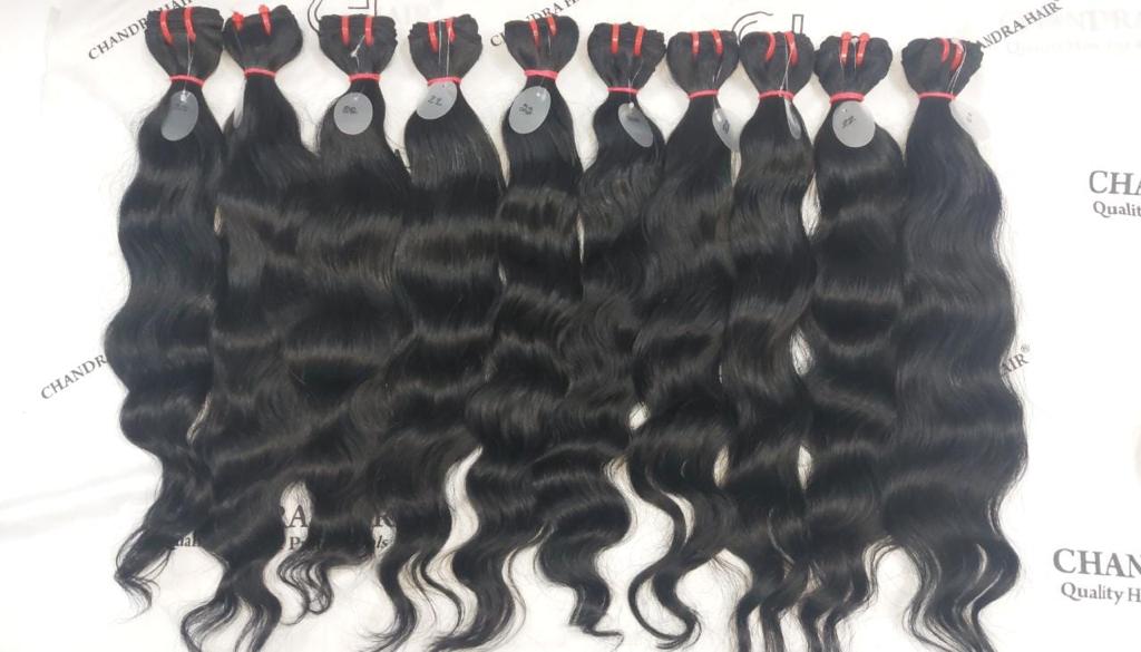 Jet black raw South Indian natural wavy weft bundles