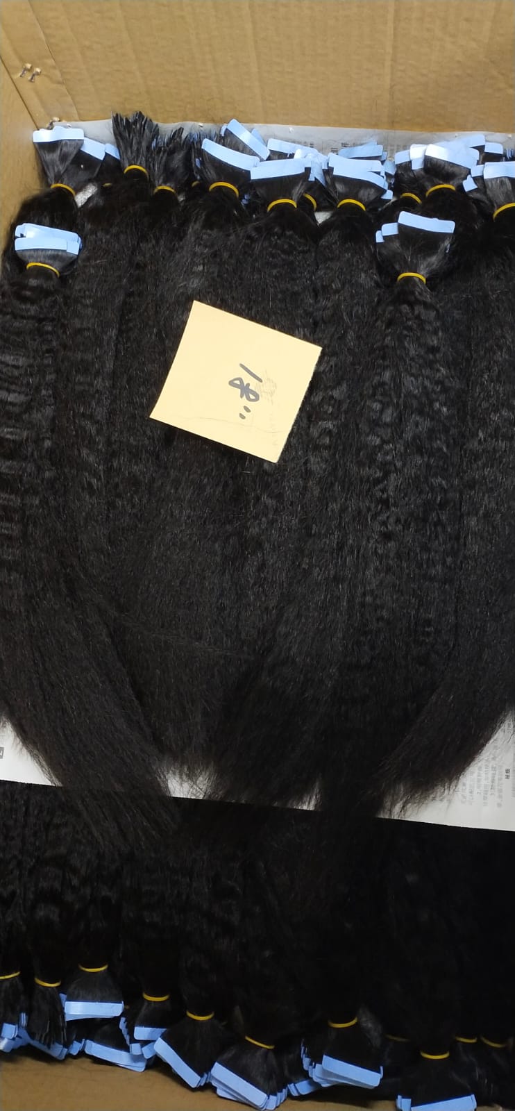 Kinky straight 9A virgin hair tape-in extensions, product photo