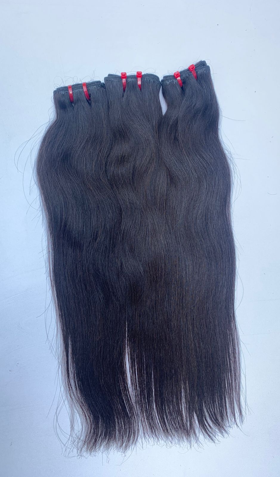 North Indian Grade 2 natural straight weft bundles (clearance), sold by the bundle