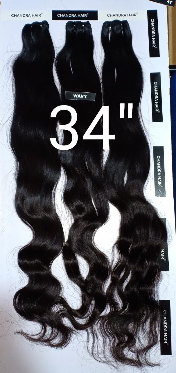 Raw South Indian hair bundles labelled 34 inches, length chart photo