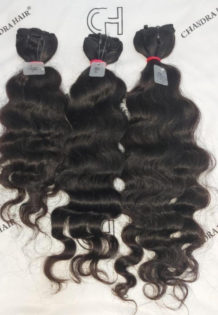 Raw South Indian natural curly weft bundles, sold by the bundle
