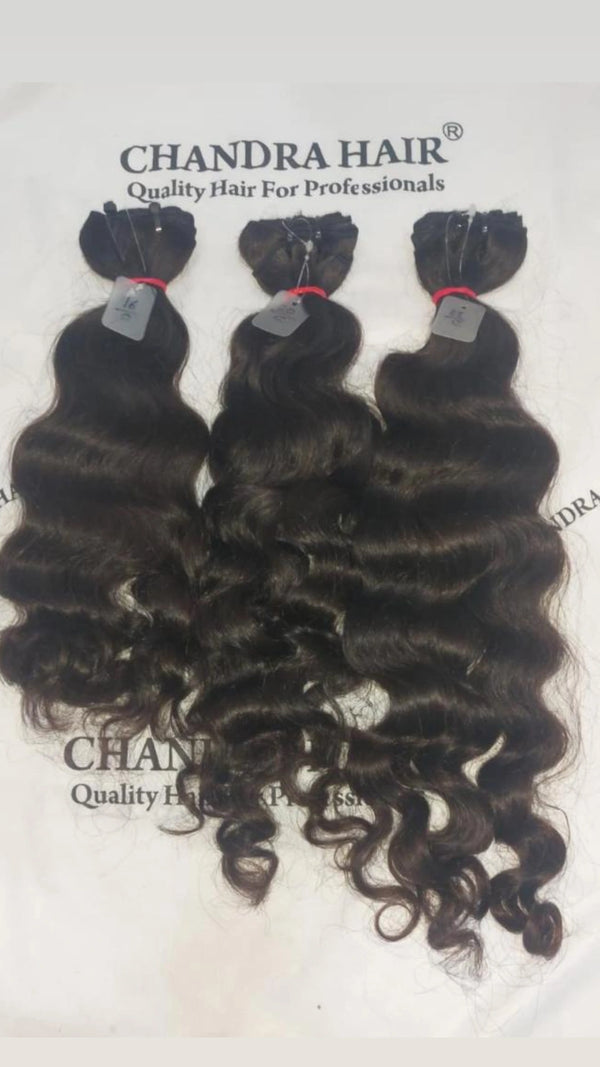 Chandra Hair three bundles of wavy black hair extensions with shiny curls for professional use
