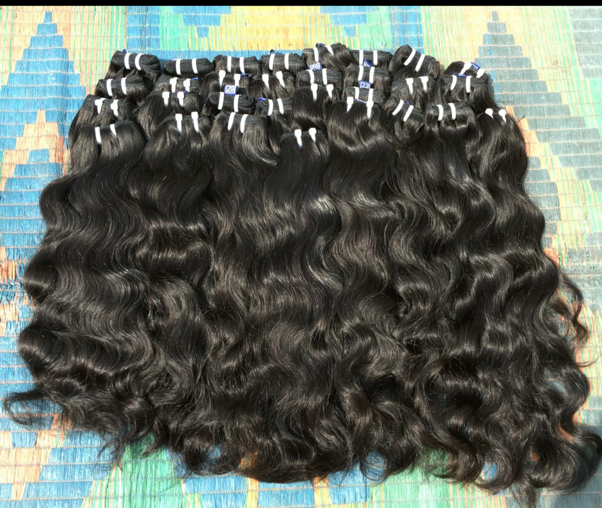 Natural wavy unprocessed North Indian hair sew-in bundles, alternate photo