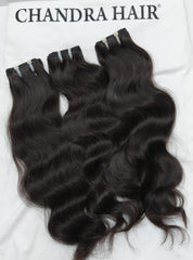 Chandra Hair natural black wavy bundles to buy North Indian raw hair online with high quality and silky texture