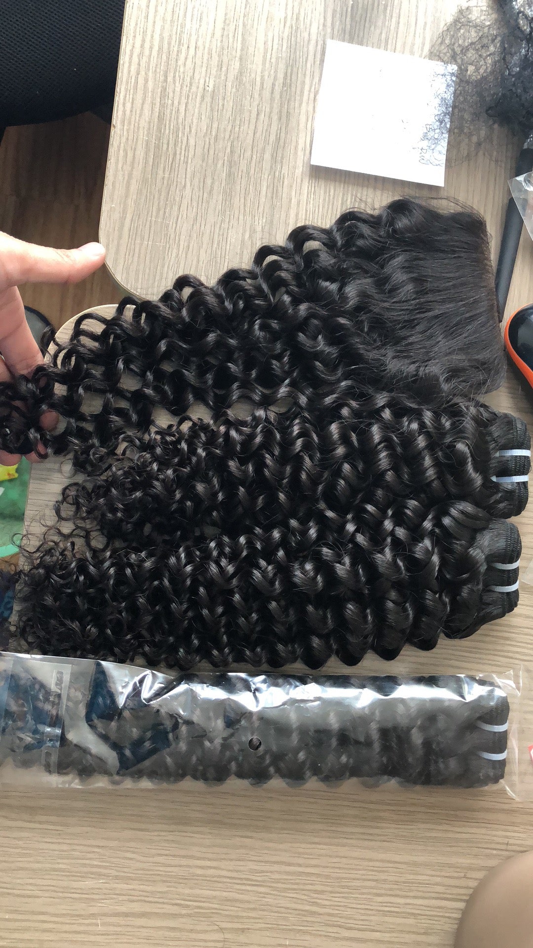 Curly 10A virgin hair weft bundles, sold by the bundle