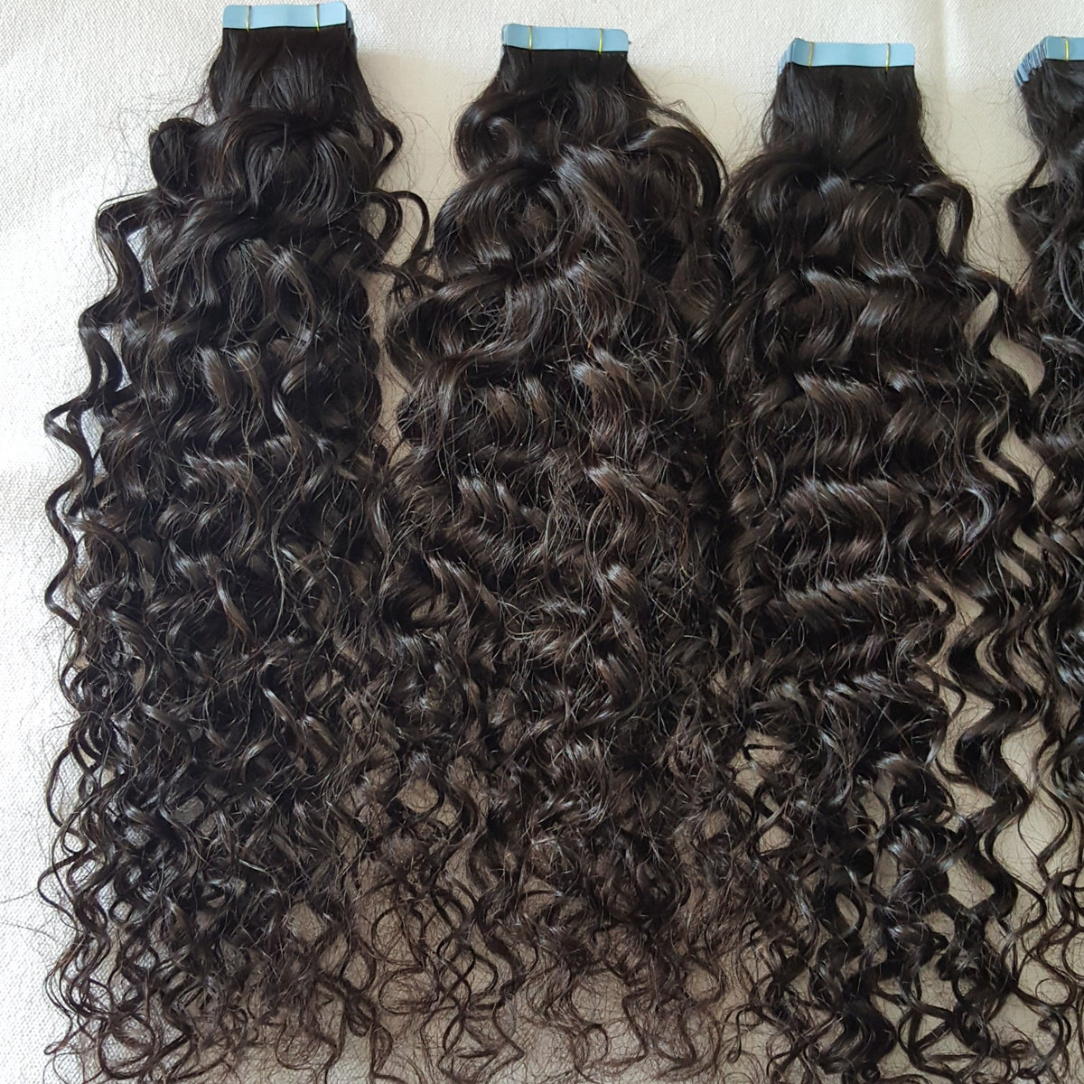 Curly 9A virgin hair tape-ins, another angle